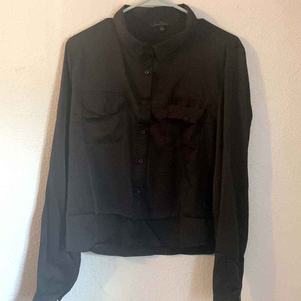 Size large black collared button up top. New without tags.